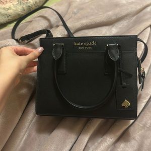 Small black Kate spade satchel in excellent condition only used once